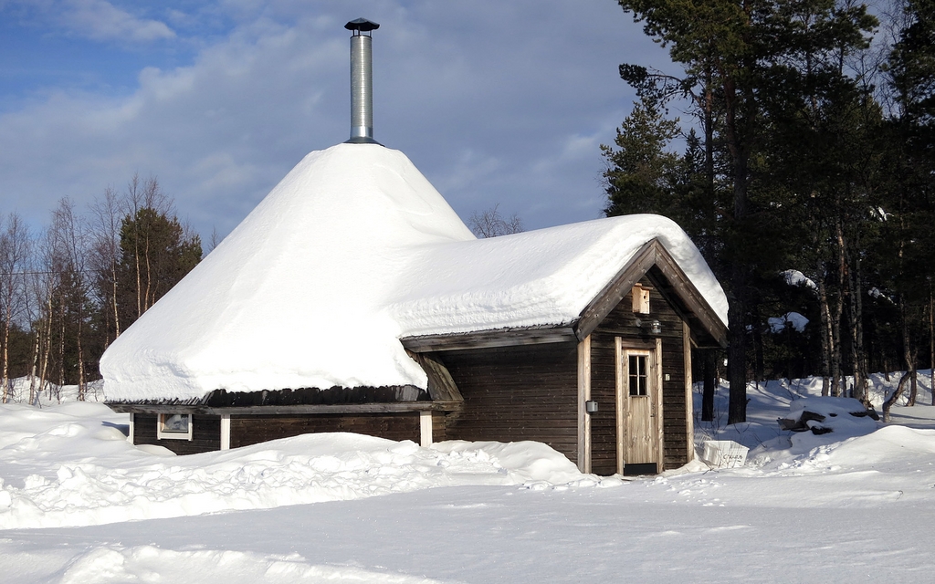 Warming up and getting a bite to eat in this traditional cone-shaped chalet