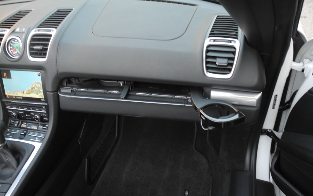The cupholders are located in a special storage place