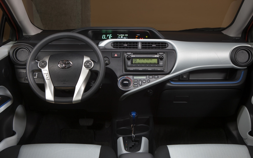 The steering wheel is a lot less attractive than the dashboard. 