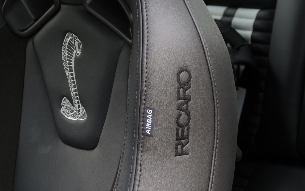 The Shelby’s cobra insignia is embroidered on the excellent Recaro seats
