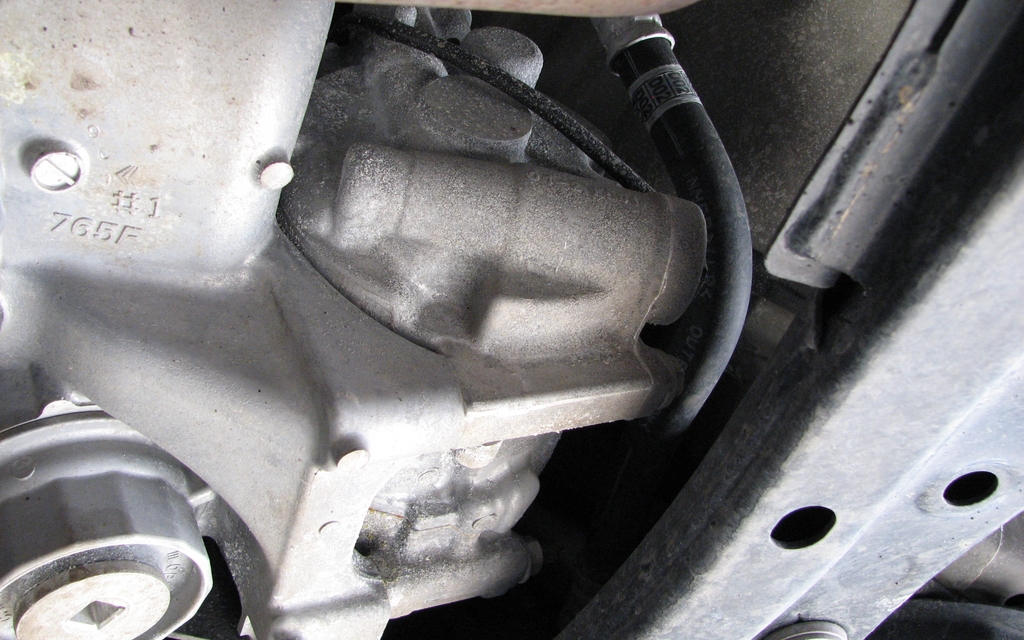 The small CVT transmission is tucked behind the engine. 