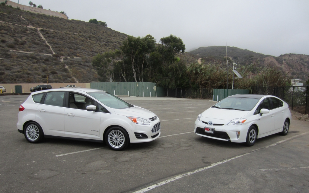 The 2013 Ford C-MAX Hybrid and the standard Toyota Prius.