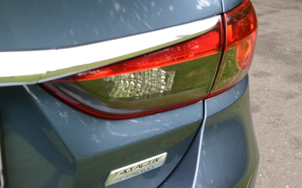 The horizontal taillights give the impression of width.