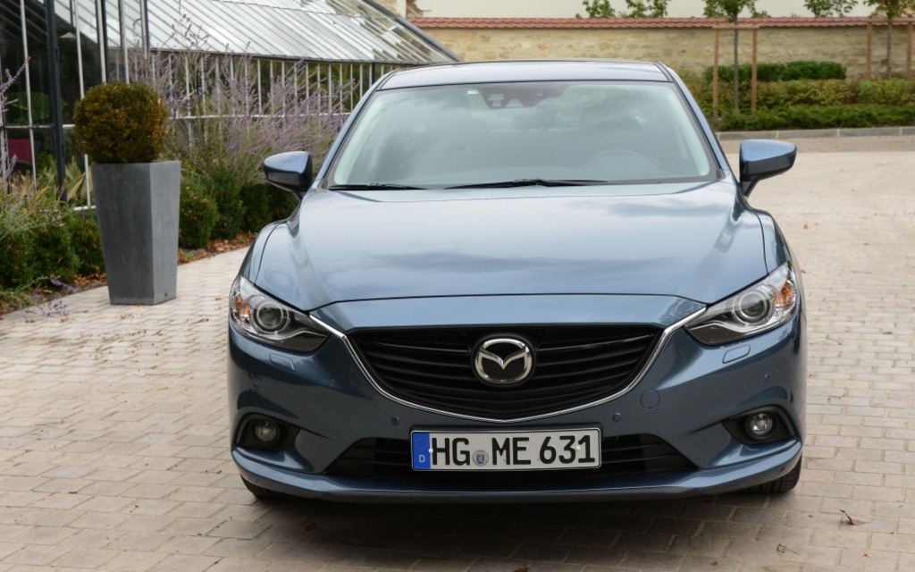 The front grille is bordered by a chrome strip that hugs its outline.