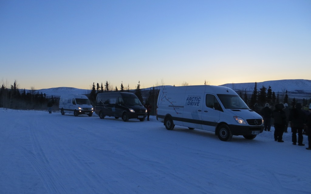 Our vans repose at the Arctic Circle.