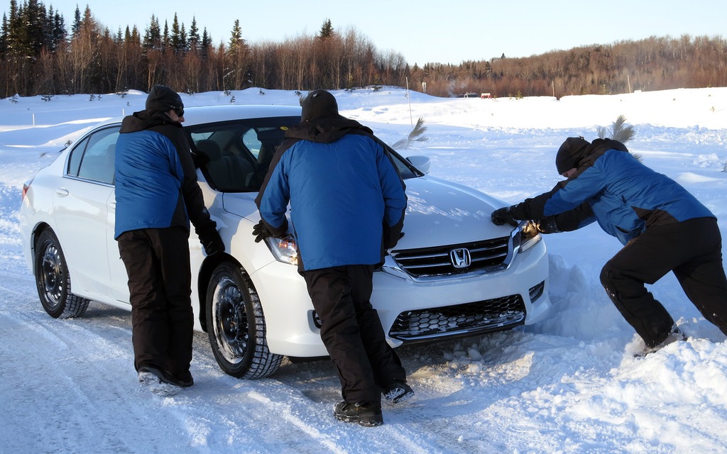 The instructors had to use their muscle to get the Honda Accord LX to budge
