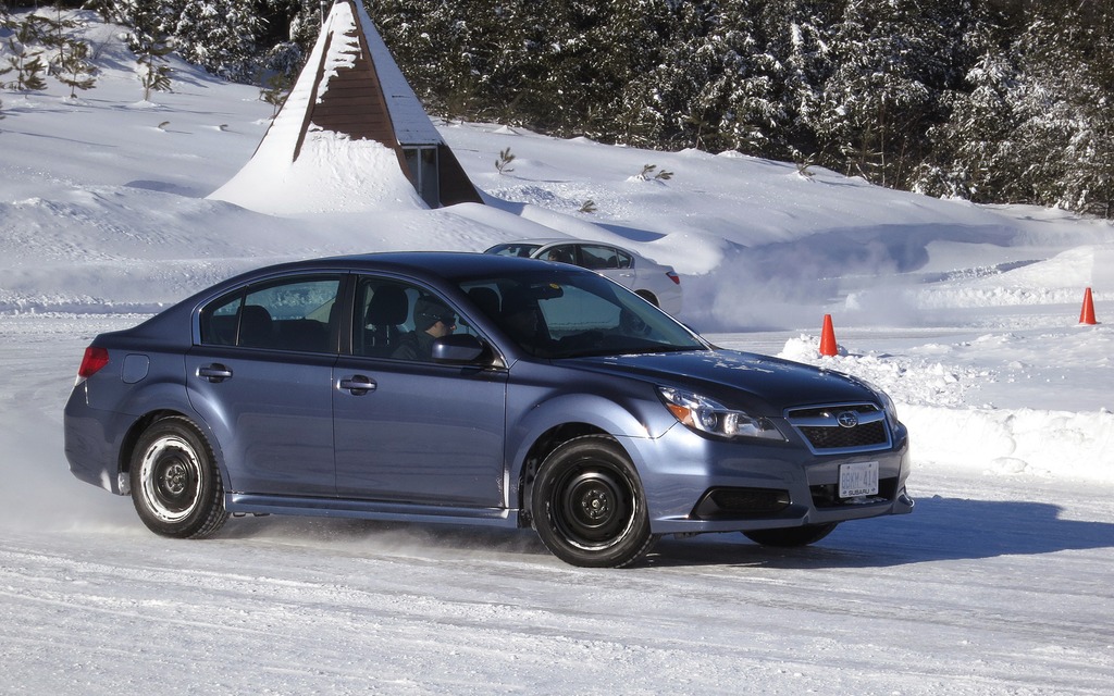 The Legacy 3.6R 2.5i passing the Accord LX in the icy drift circle 