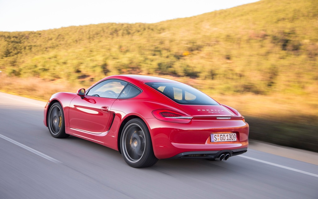 The 2014 Porsche Cayman S on the roads of the Algarve region in Portugal.