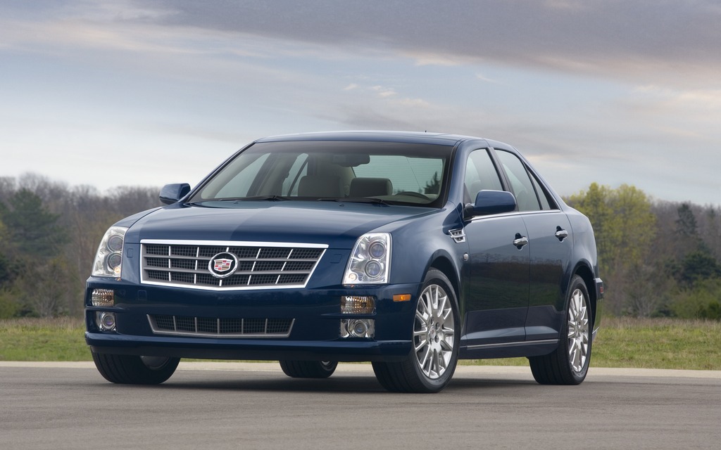 2 Cadillac STS (2 sales)