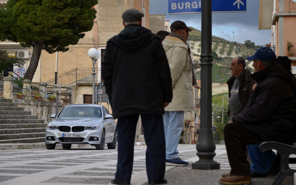 The 2014 BMW 3 Series Gran Turismo on a town square in Sicily
