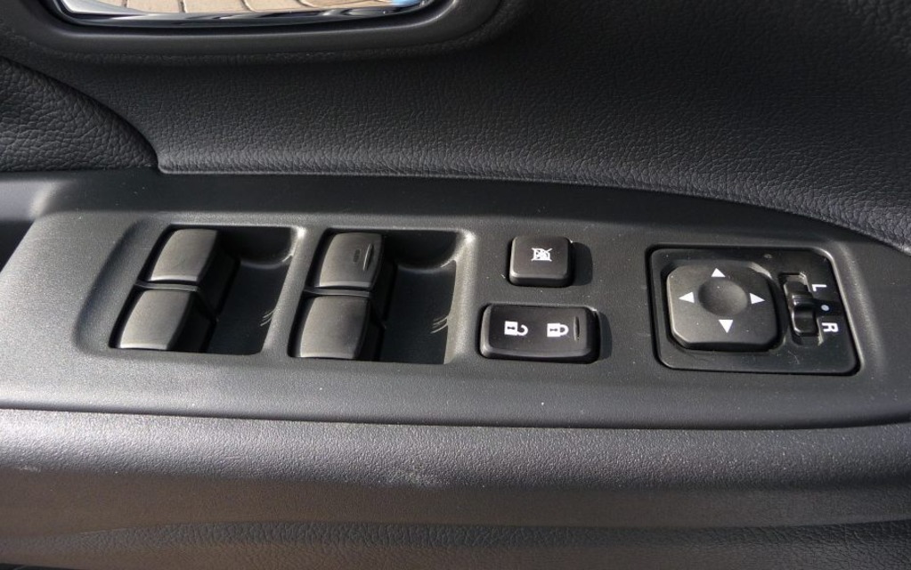 The outside rearview controls are within easy reach. 