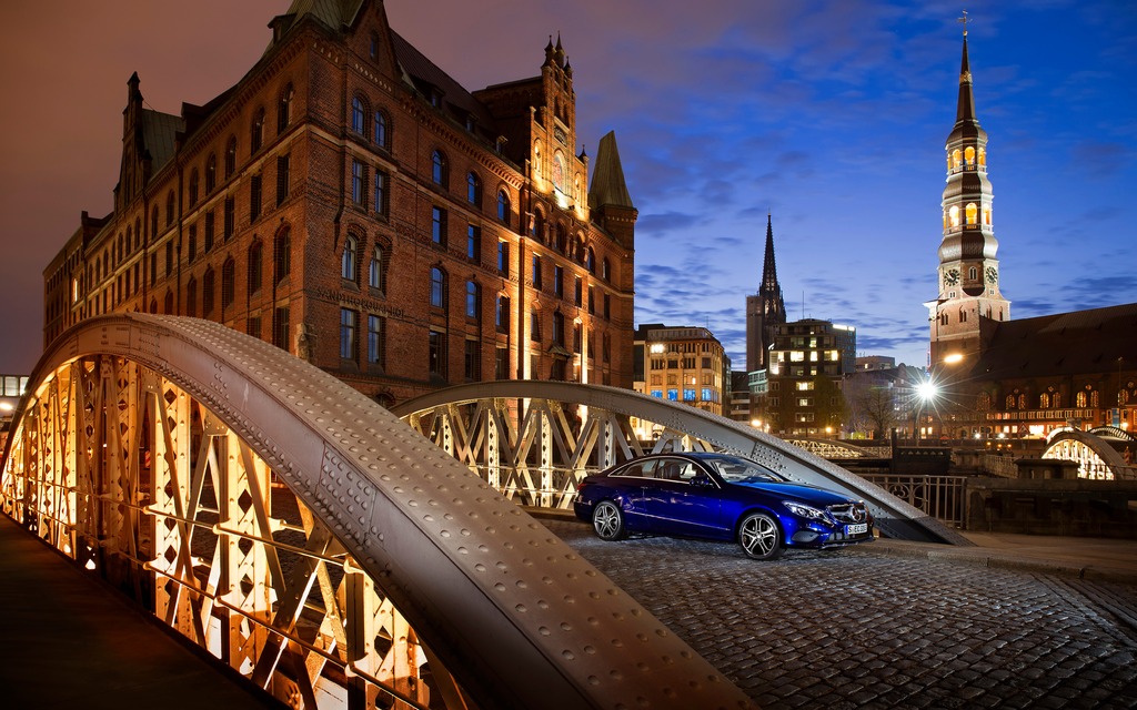 2014 Mercedes-Benz E-Class Coupe at dusk in Hamburg, Germany.