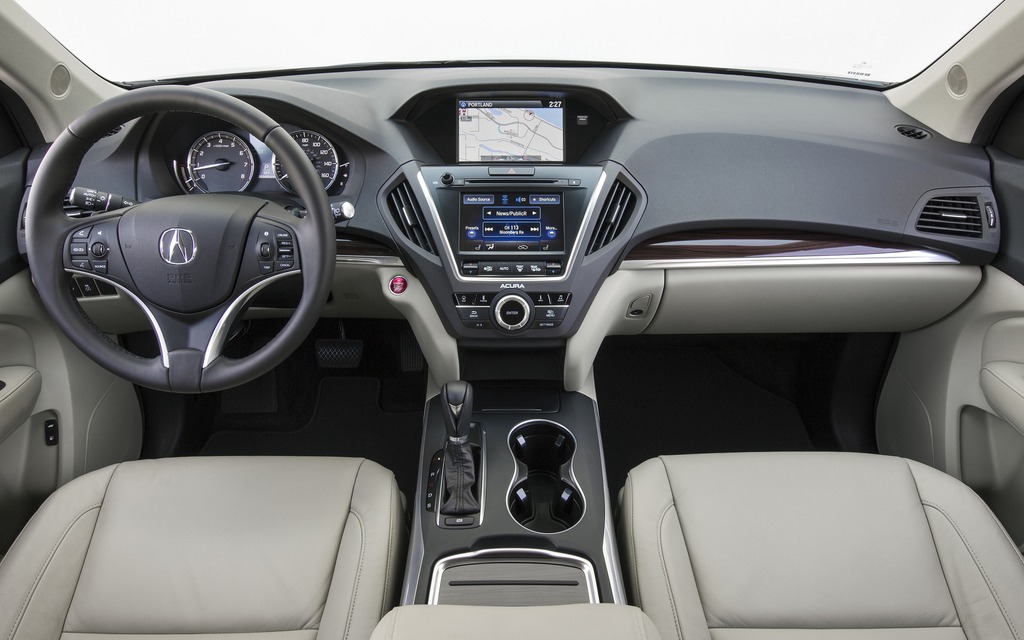 The dashboard features handmade real wood trim for the first time