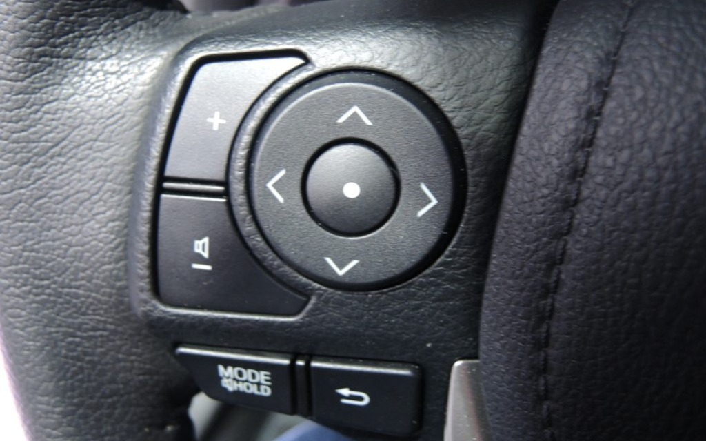 Control button on the steering wheel’s left spoke. 