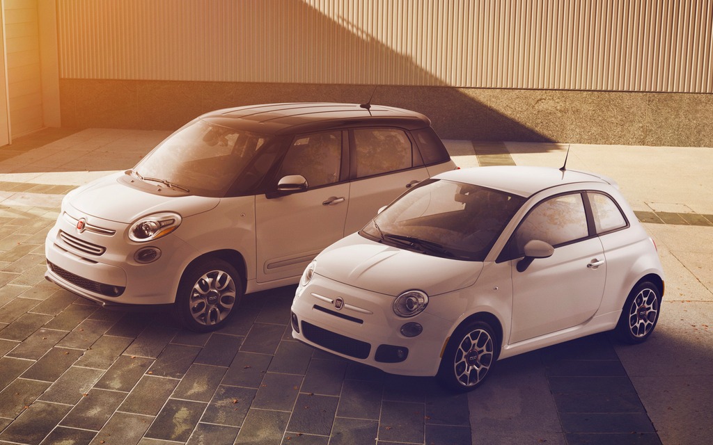 The Fiat 500L (back) is much larger than the two-door 500 (front). 