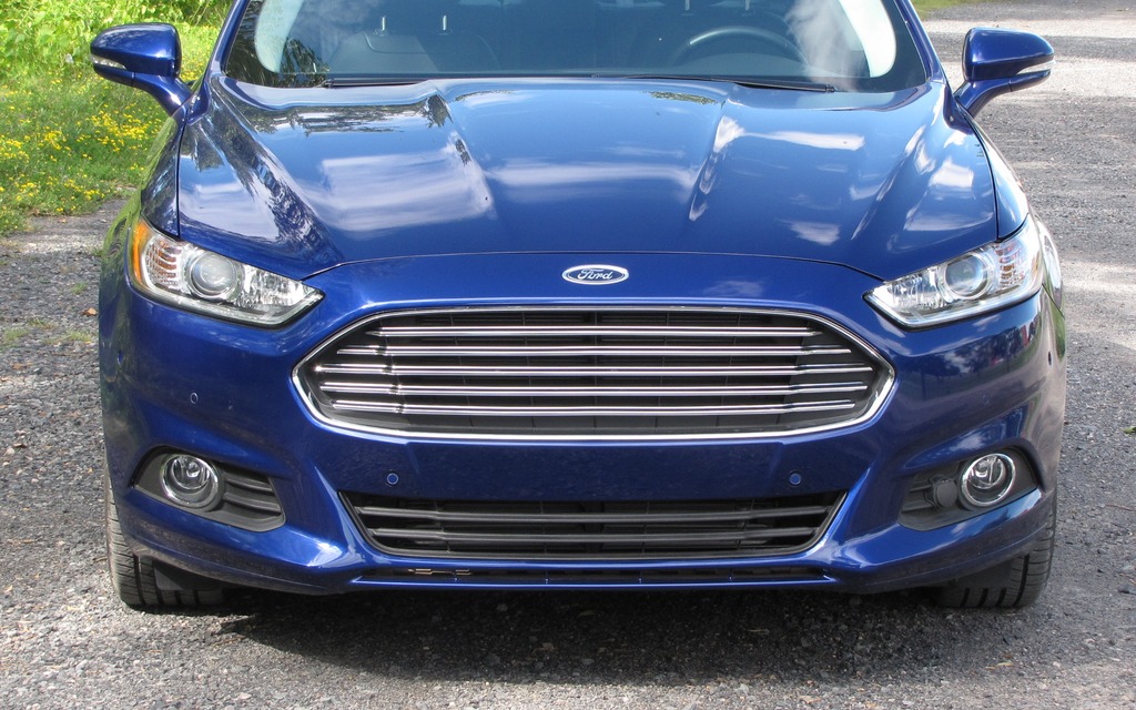 The vehicle is graced by an Aston Martin grille