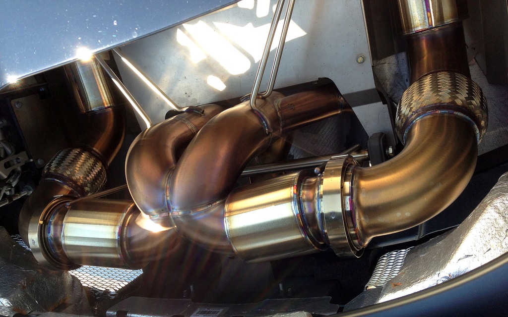 The Veyron’s new exhaust is already tinted gold with the extreme heat.