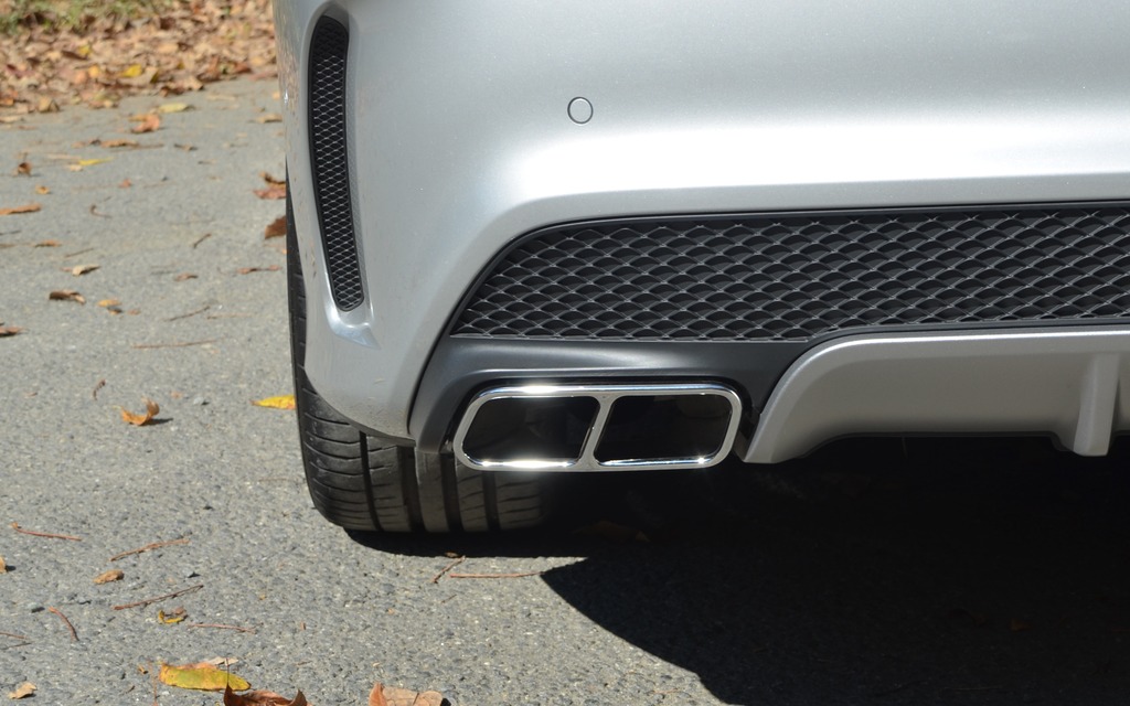 The AMG has twin exhaust tips.
