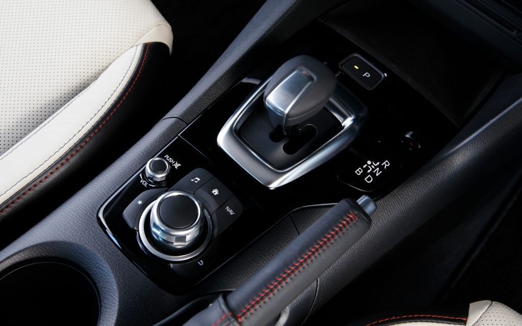 The Mazda3 Hybrid features the same gear shifter as Toyota’s models.