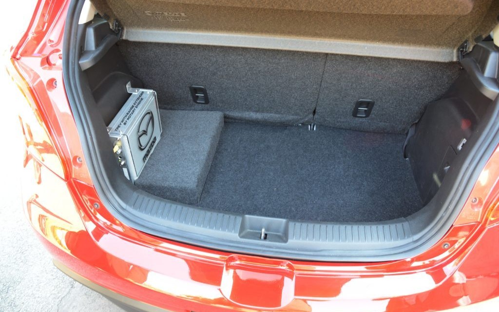 The Mazda2 EV’s trunk is almost as big as the conventional version’s.