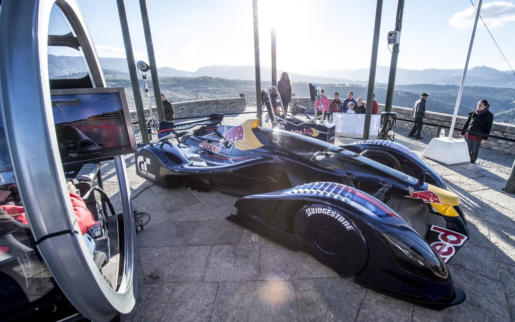 A Gran Turismo simulator, next to the Red Bull X2010, created for the game.