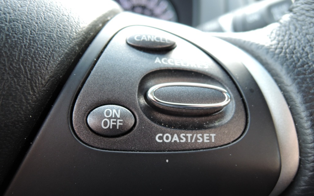 The cruise control buttons are on the right spoke of the steering wheel.