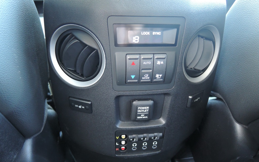 Controls behind the centre console.