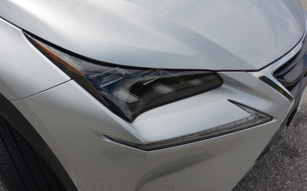 The headlamps are inspired by those on the IS sedan.