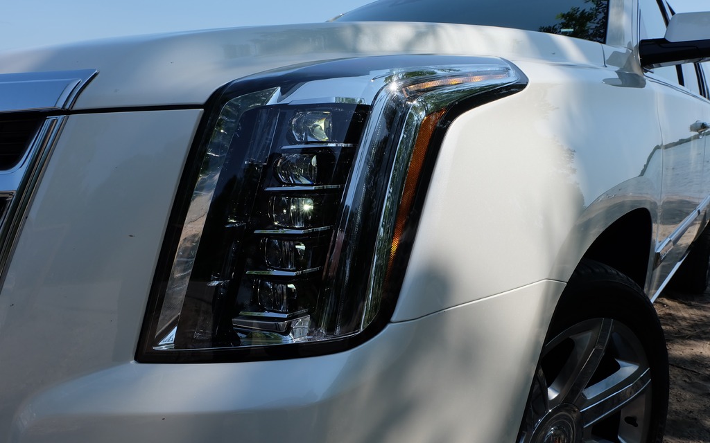 The Escalade's styling is much more angular.