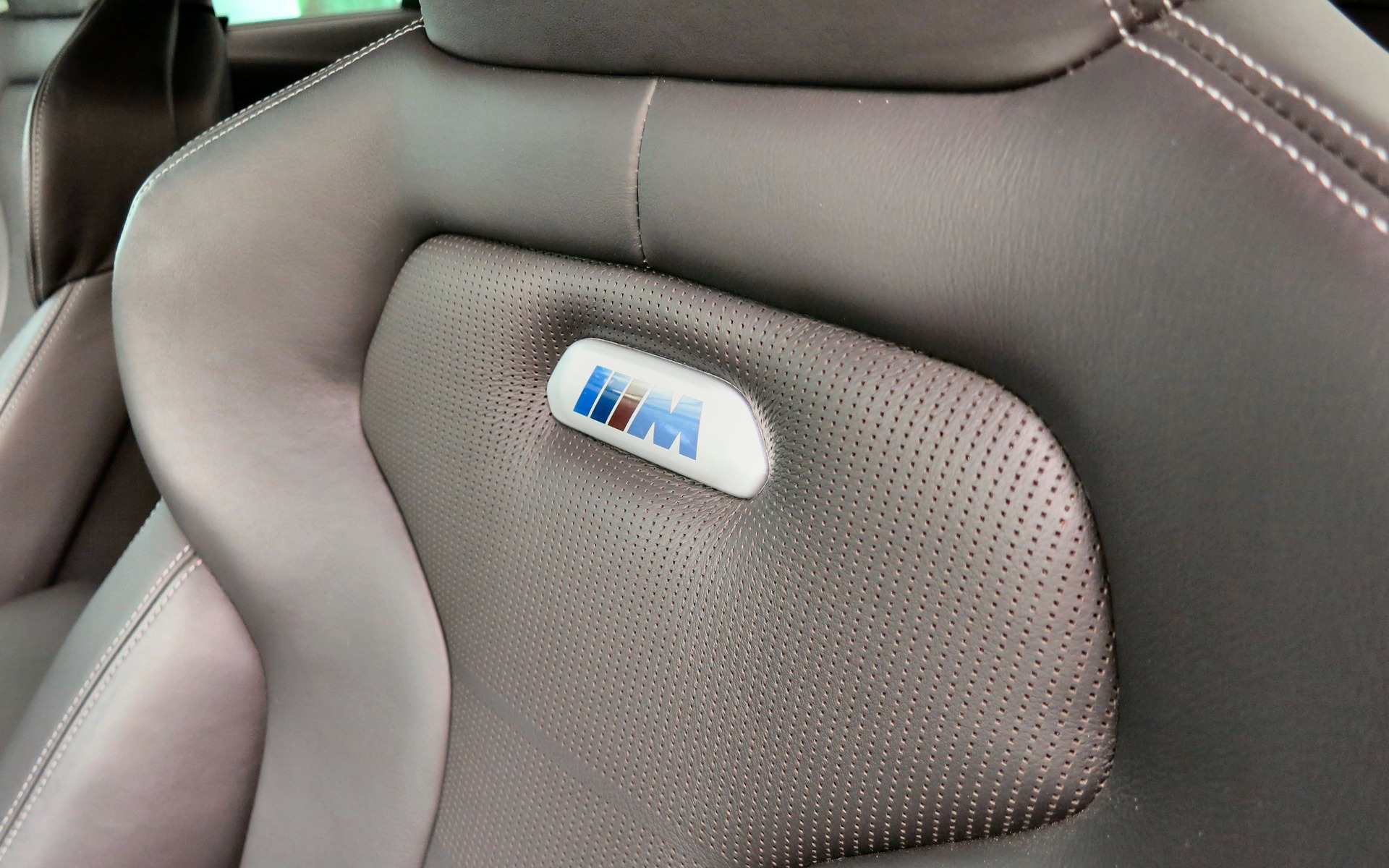 The M-logo sport seats offer power inflatable side bolsters.