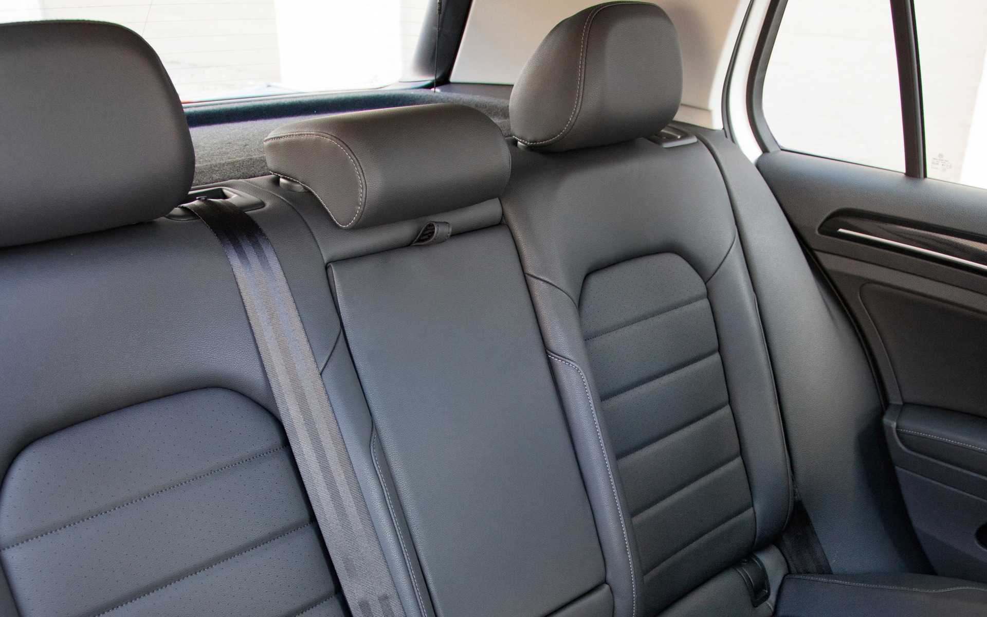 The rear seat folds forward for ample cargo storage.