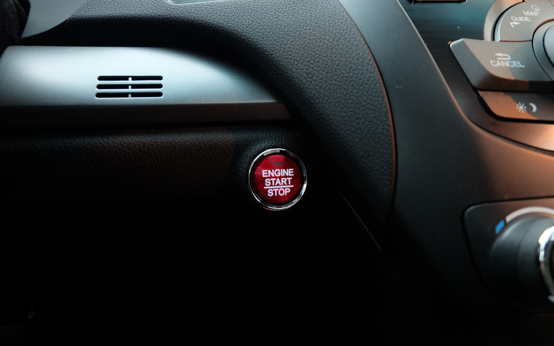 Honda's typical red button adds a bit of colour to the dashboard.