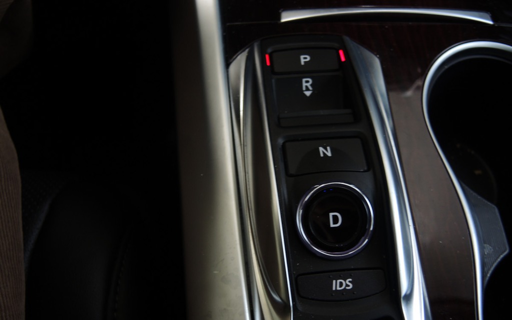 Shifter buttons on the console with the V6 engine.