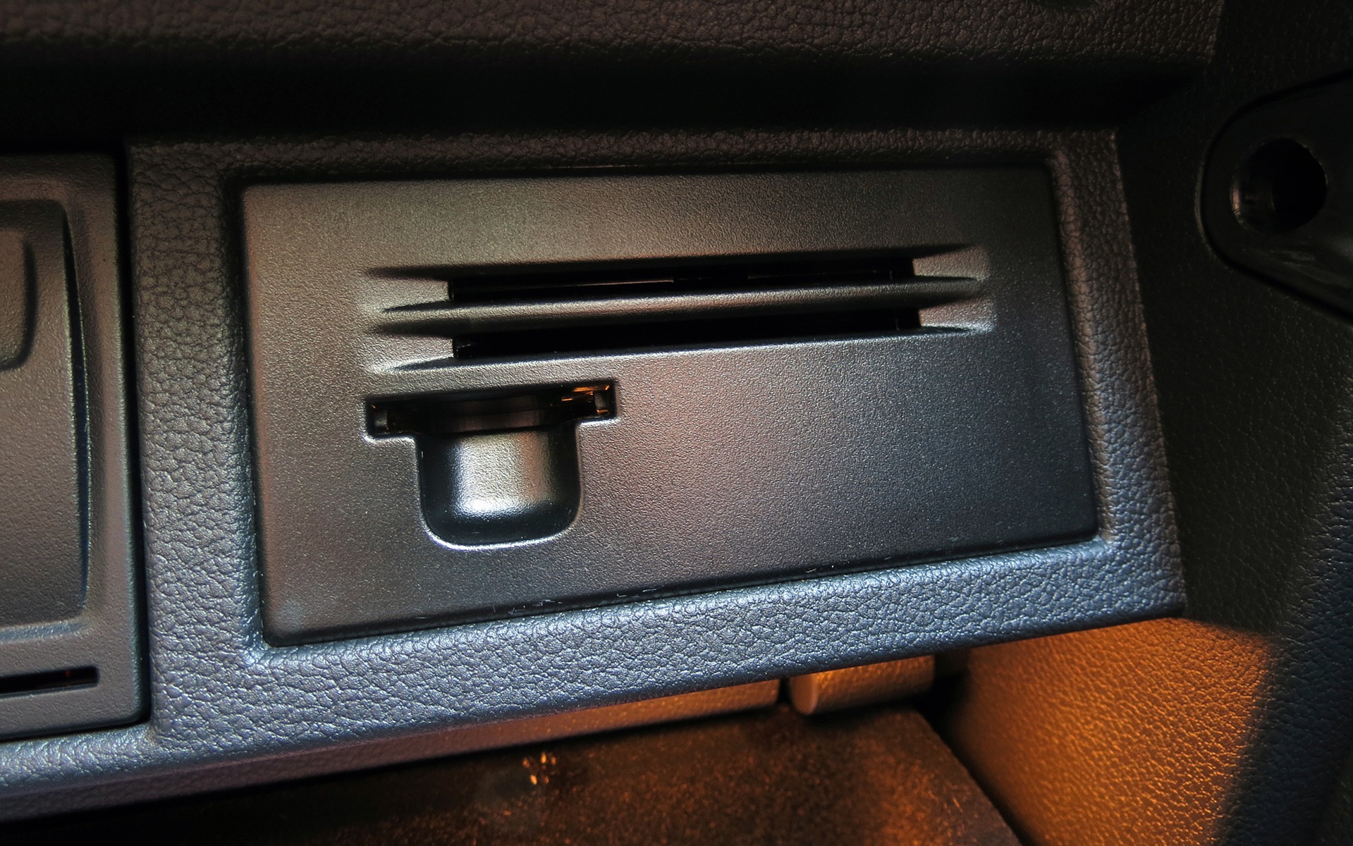 Slots to accommodate other devices in the glovebox.