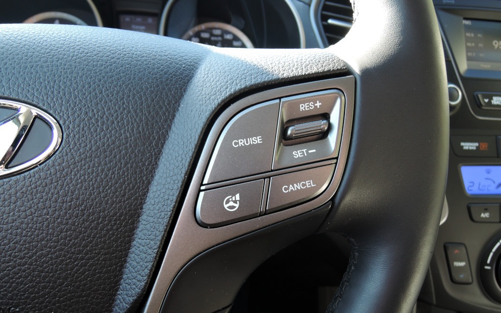 The power steering and cruise control buttons.