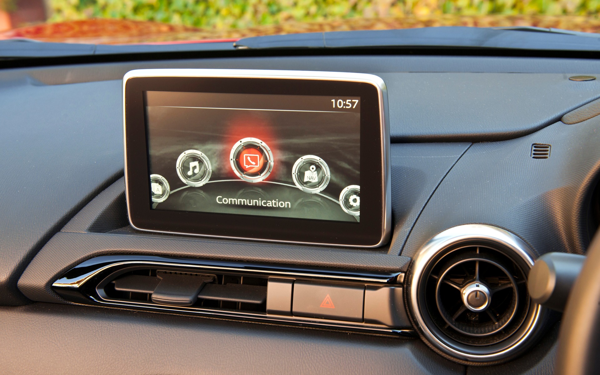 As in the Mazda3, the multimedia screen presides in the middle of the dash.