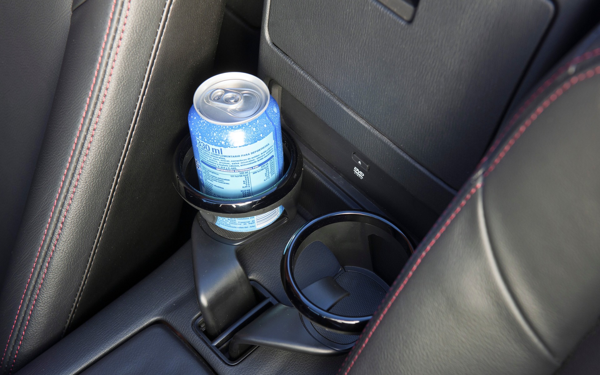 The cupholders are fairly useless due to their location.