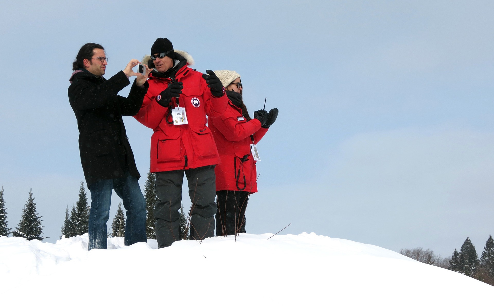 Journalist Alain McKenna in video mode beside instructor Pierre Des Marais.