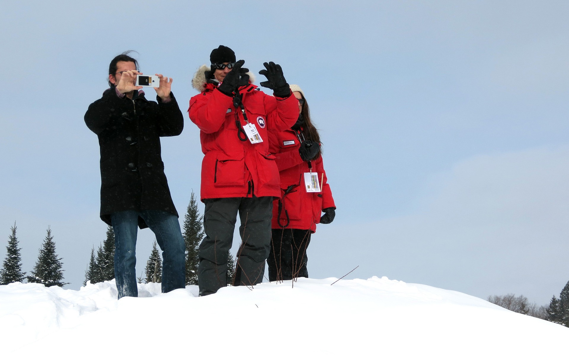 Journalist Alain McKenna in video mode beside instructor Pierre Des Marais.