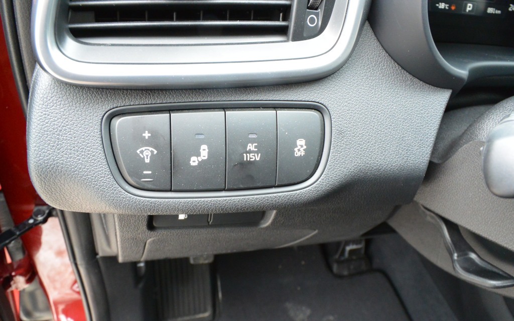 Blind spot detection and stability control buttons.