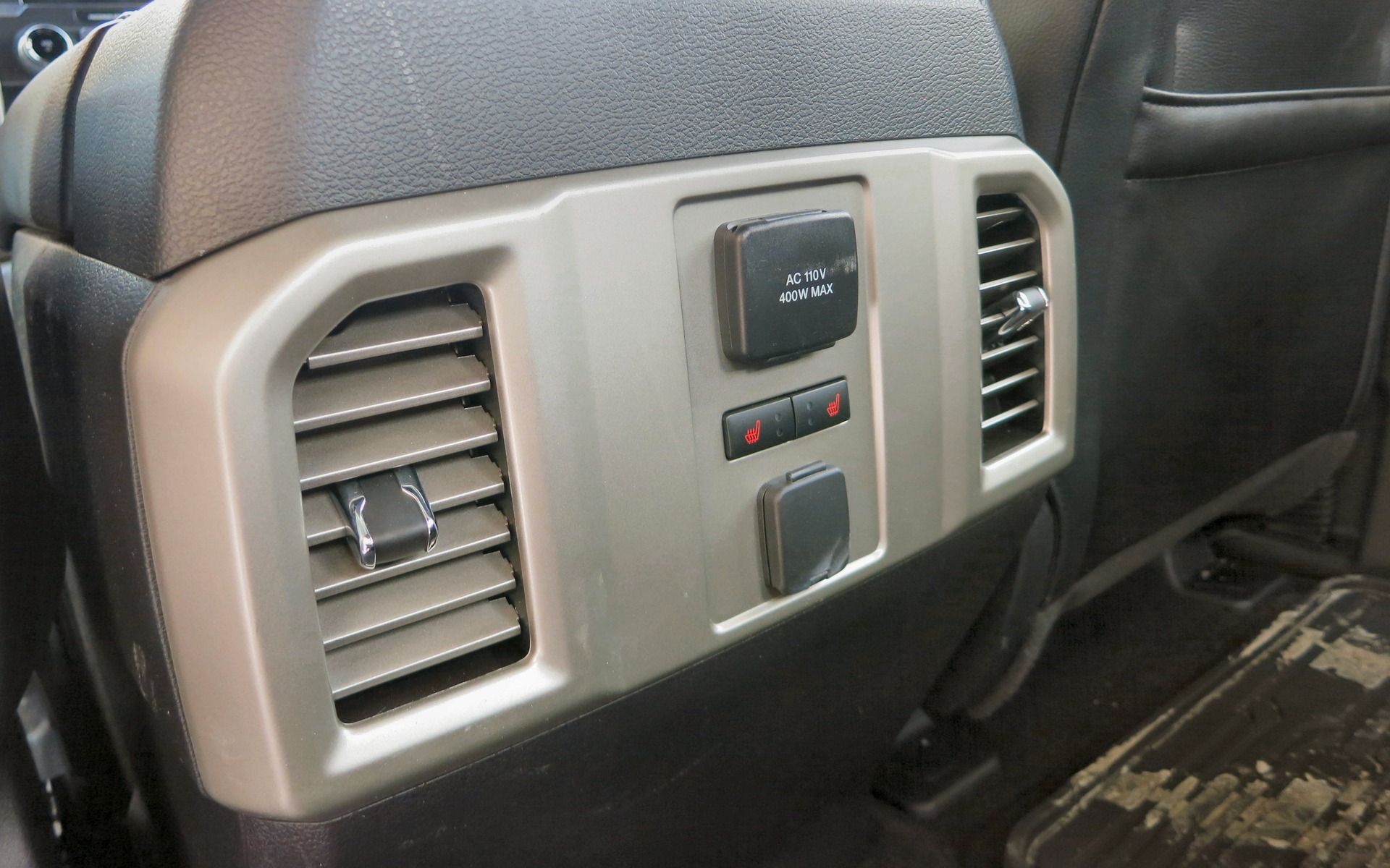 Power outlets and heated seats greet rear passengers.