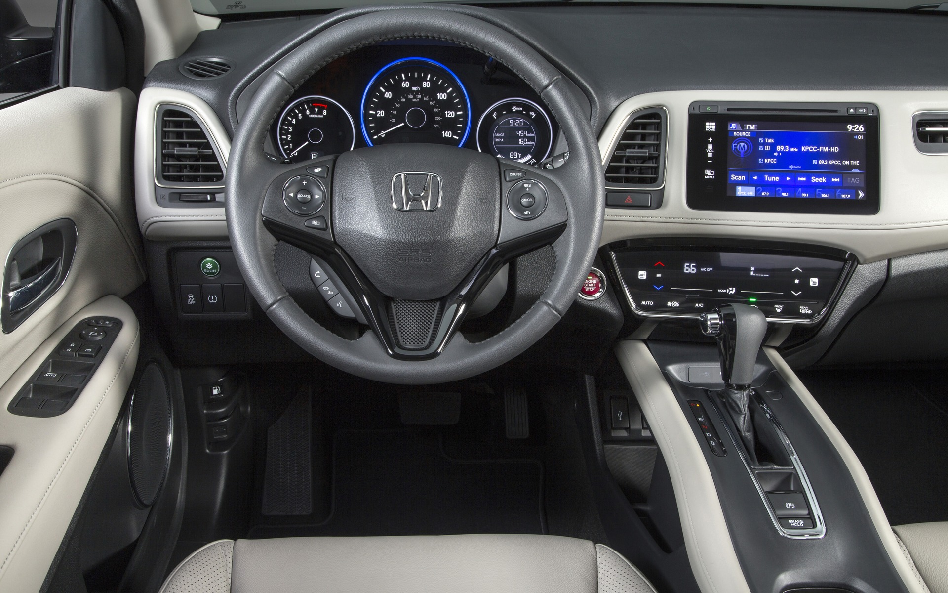 Multifunction steering wheel and colour touchscreen.