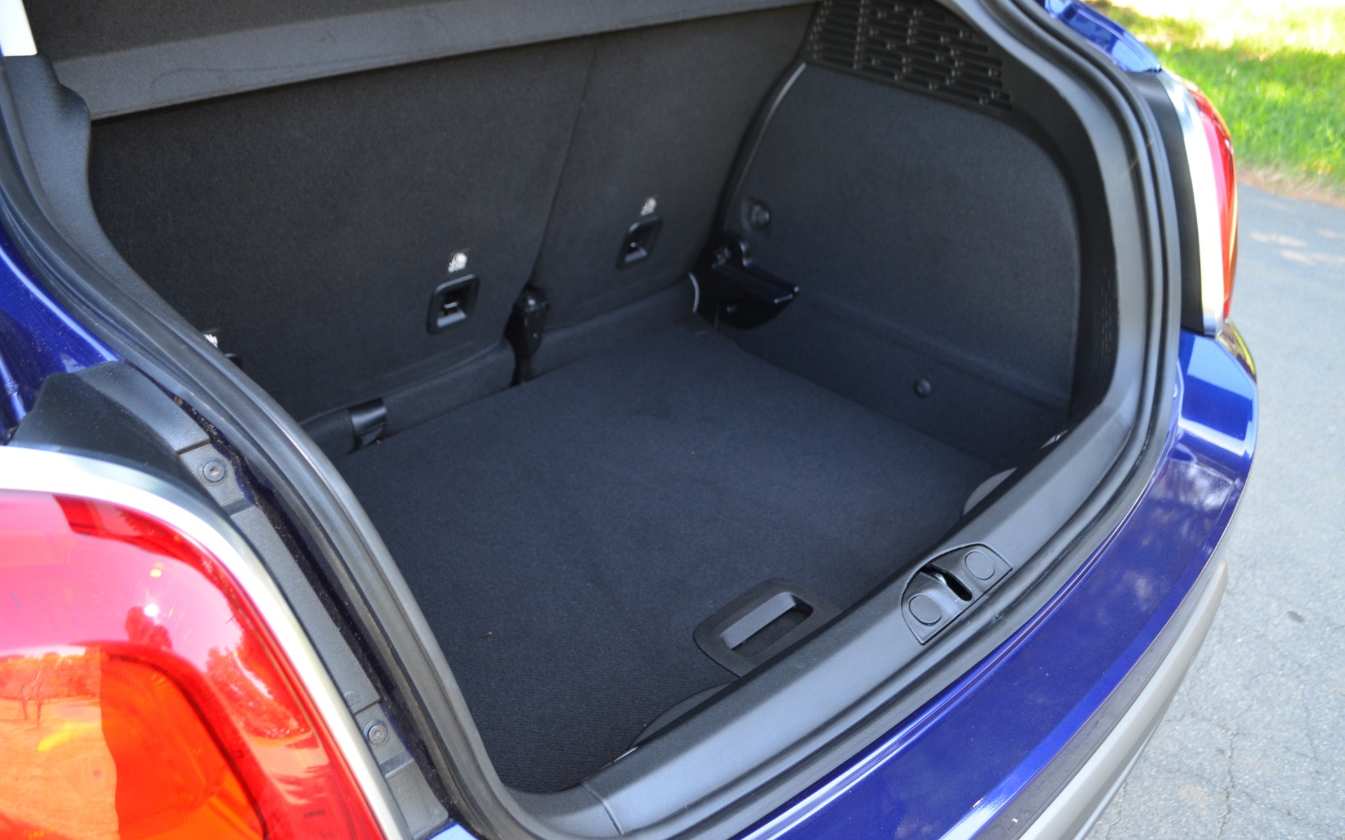 ... or lowered to the bottom of the trunk for added vertical space.