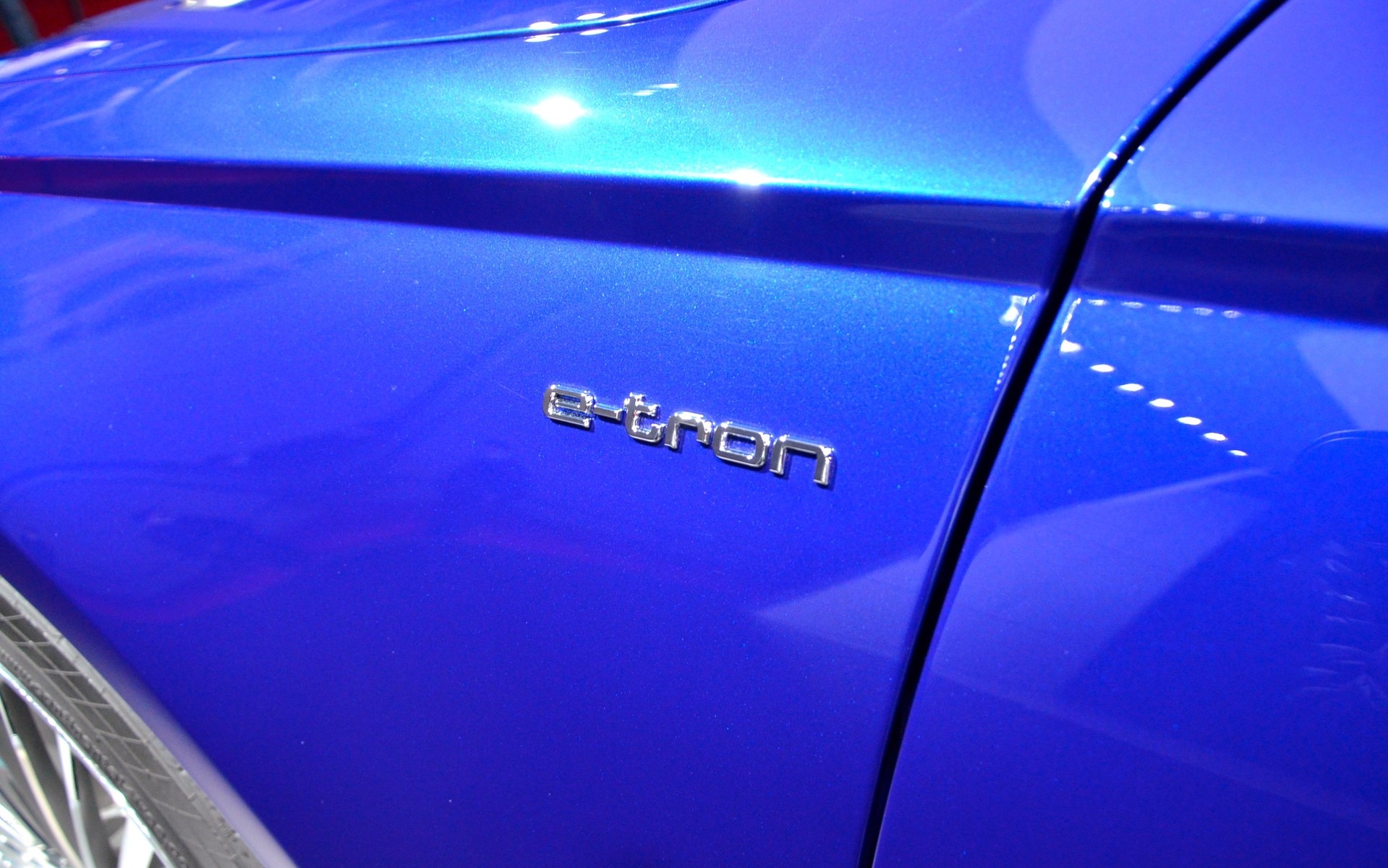 The e-tron emblem is seen on the front fenders.