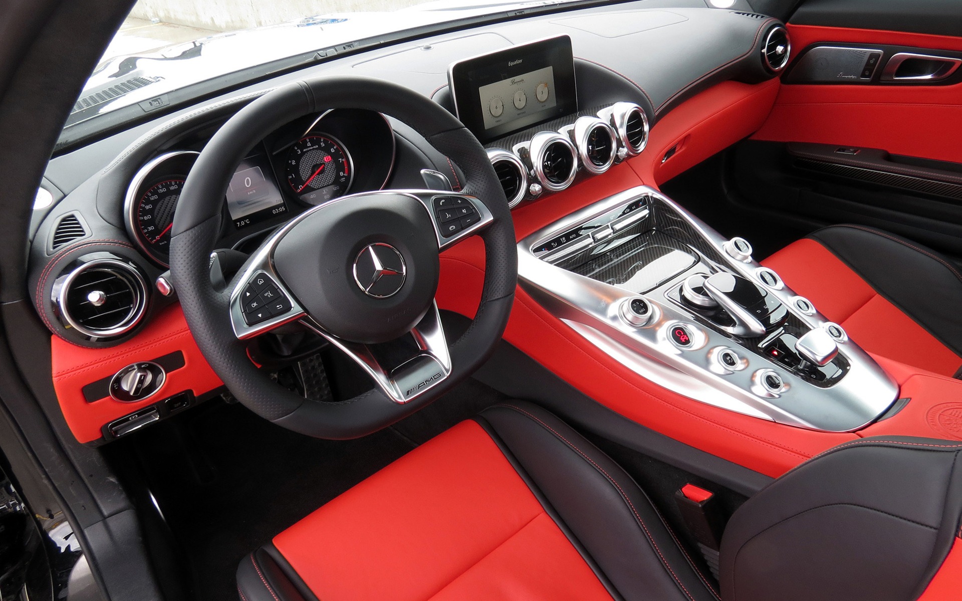 The cabin of the GT S is beautiful and photogenic in red and black.