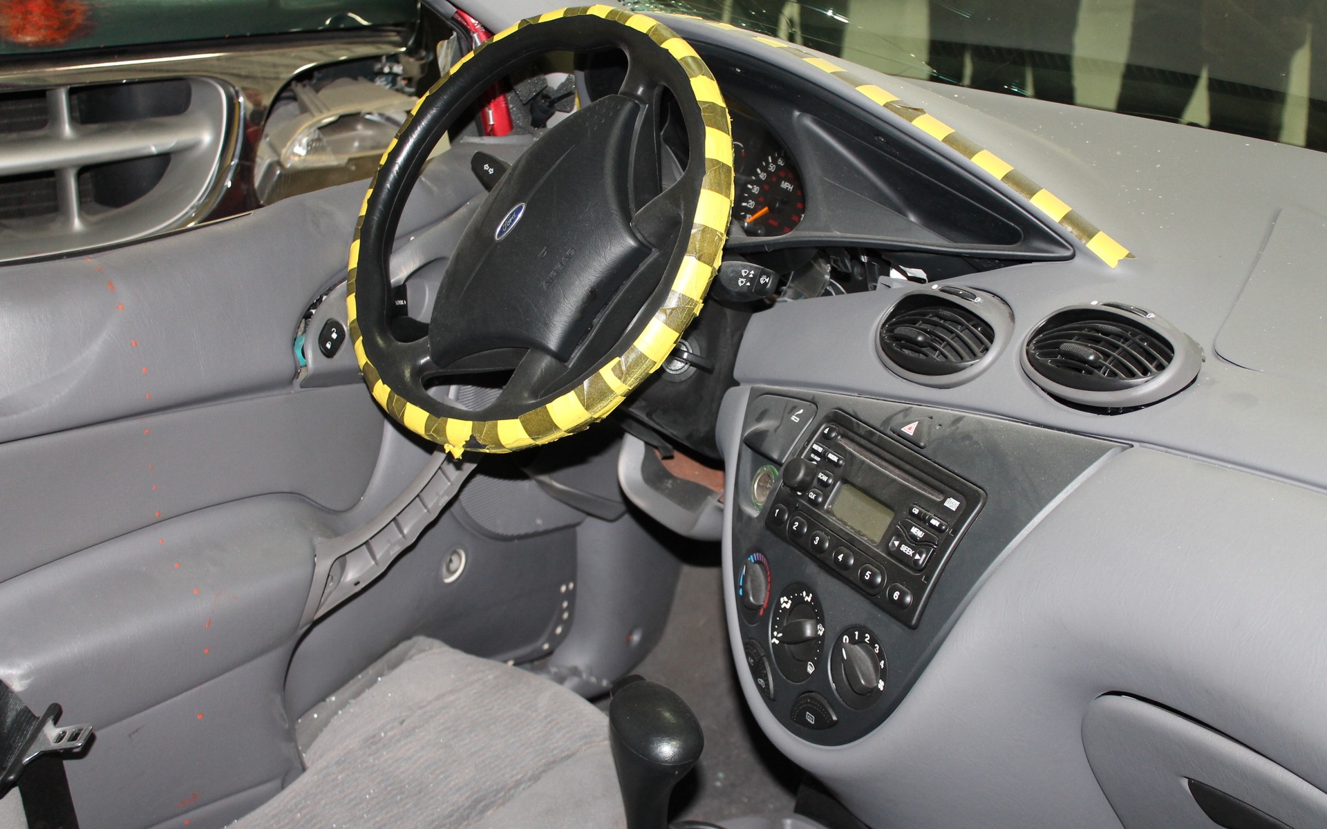 The cockpit of a first-gen Ford Focus.