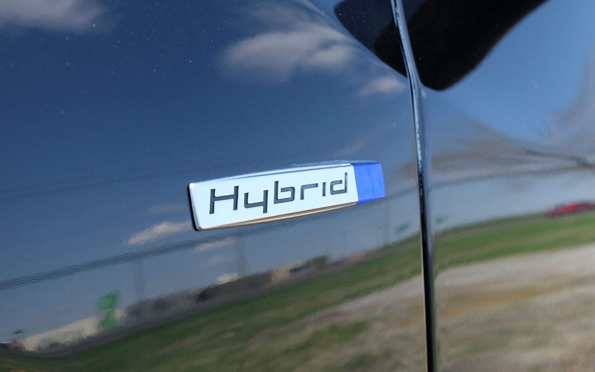 On this car, the Hybrid badge doesn't mean it's boring.
