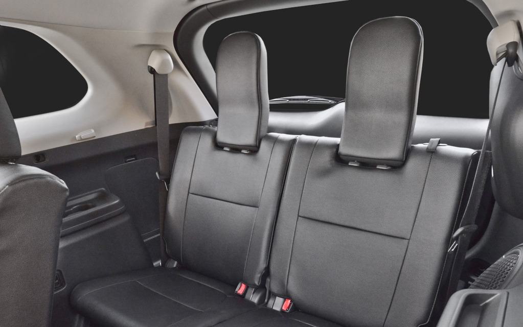 The third-row headrests obstruct rear visibility in the Outlander.