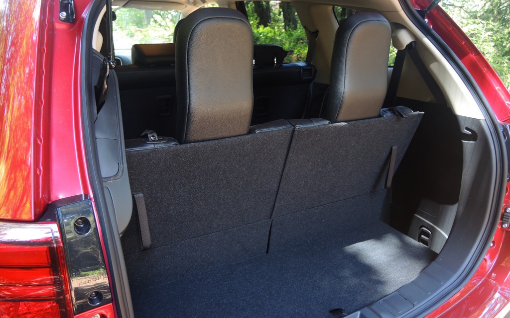 The cargo area is seriously reduced when the third row is raised.