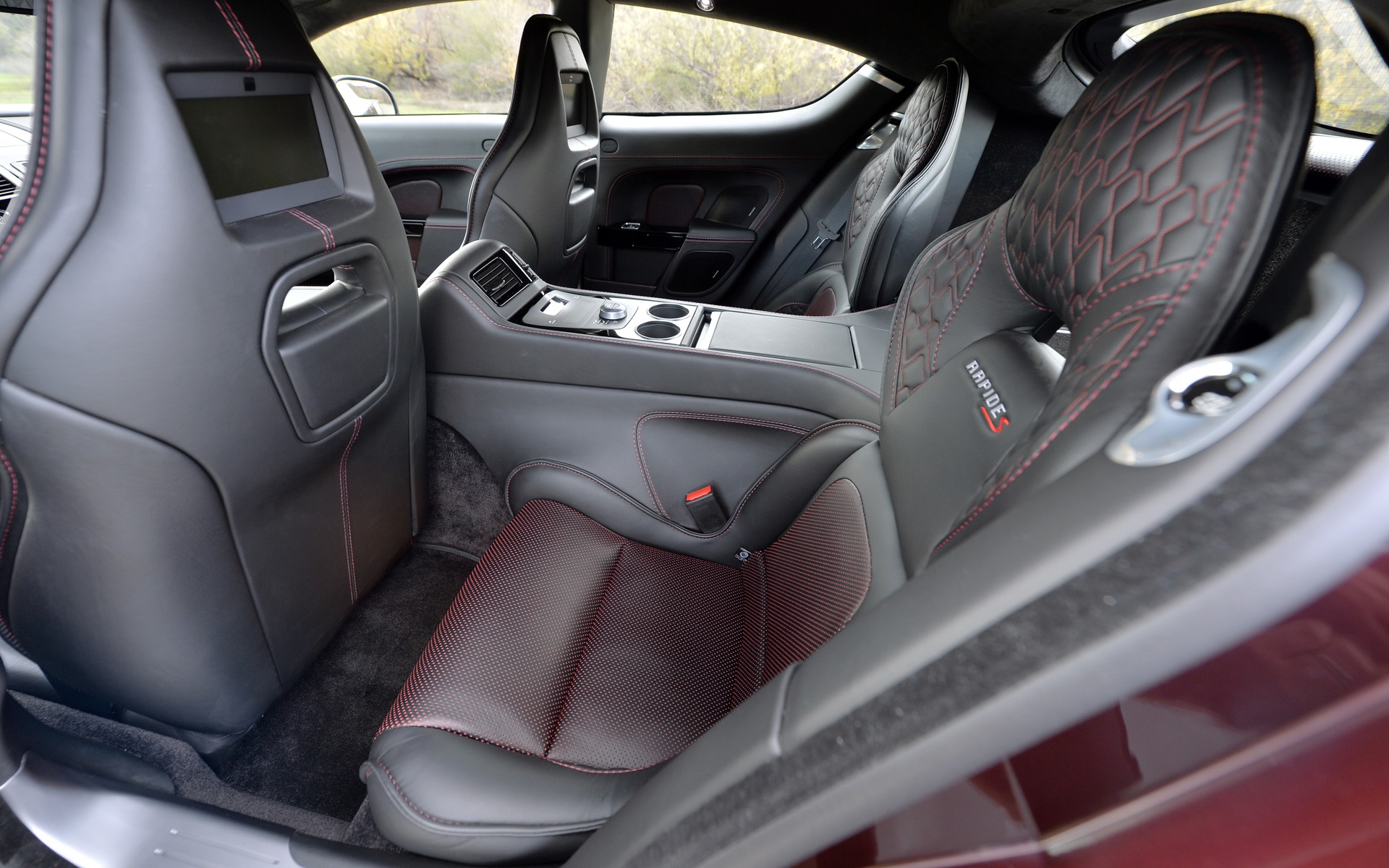The rear seats in the Rapide S are tight; nothing like other luxury sedans.